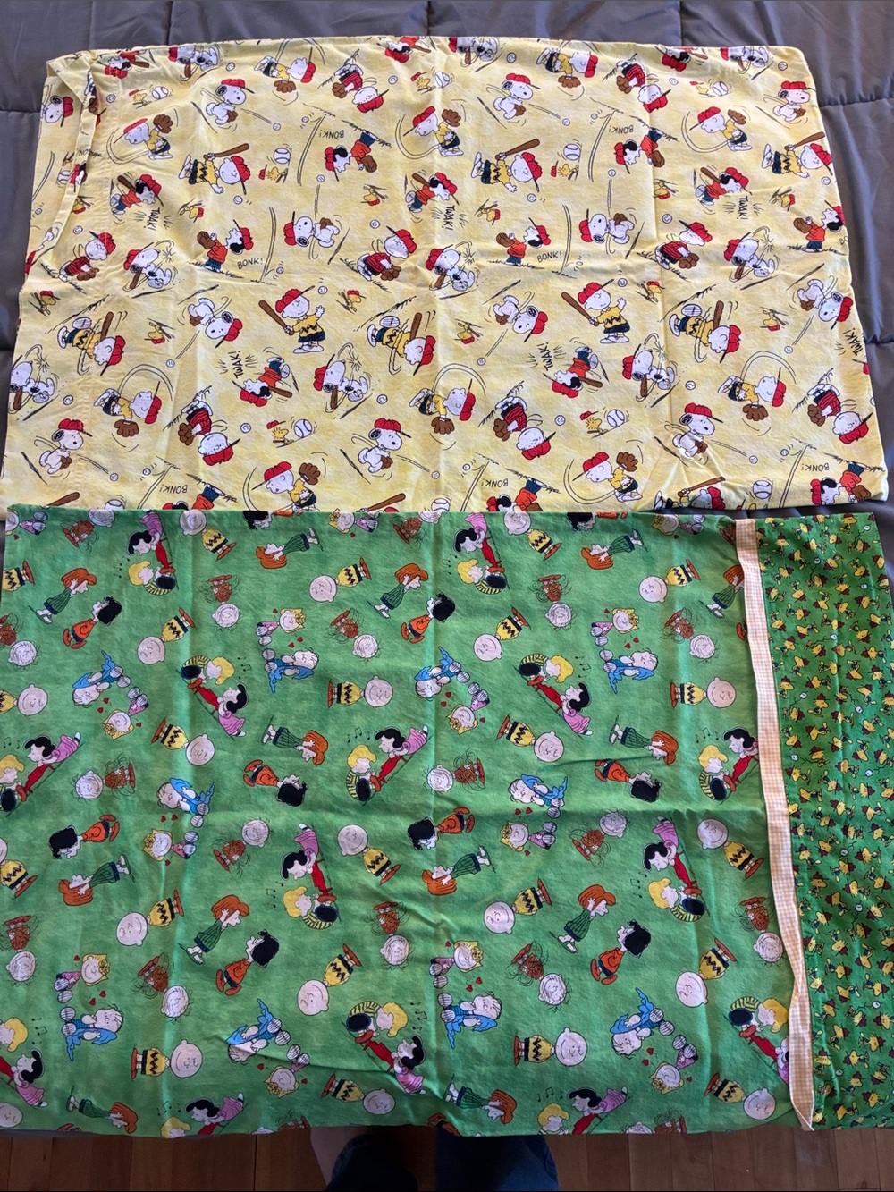 Two Peanuts characters pillowcases
